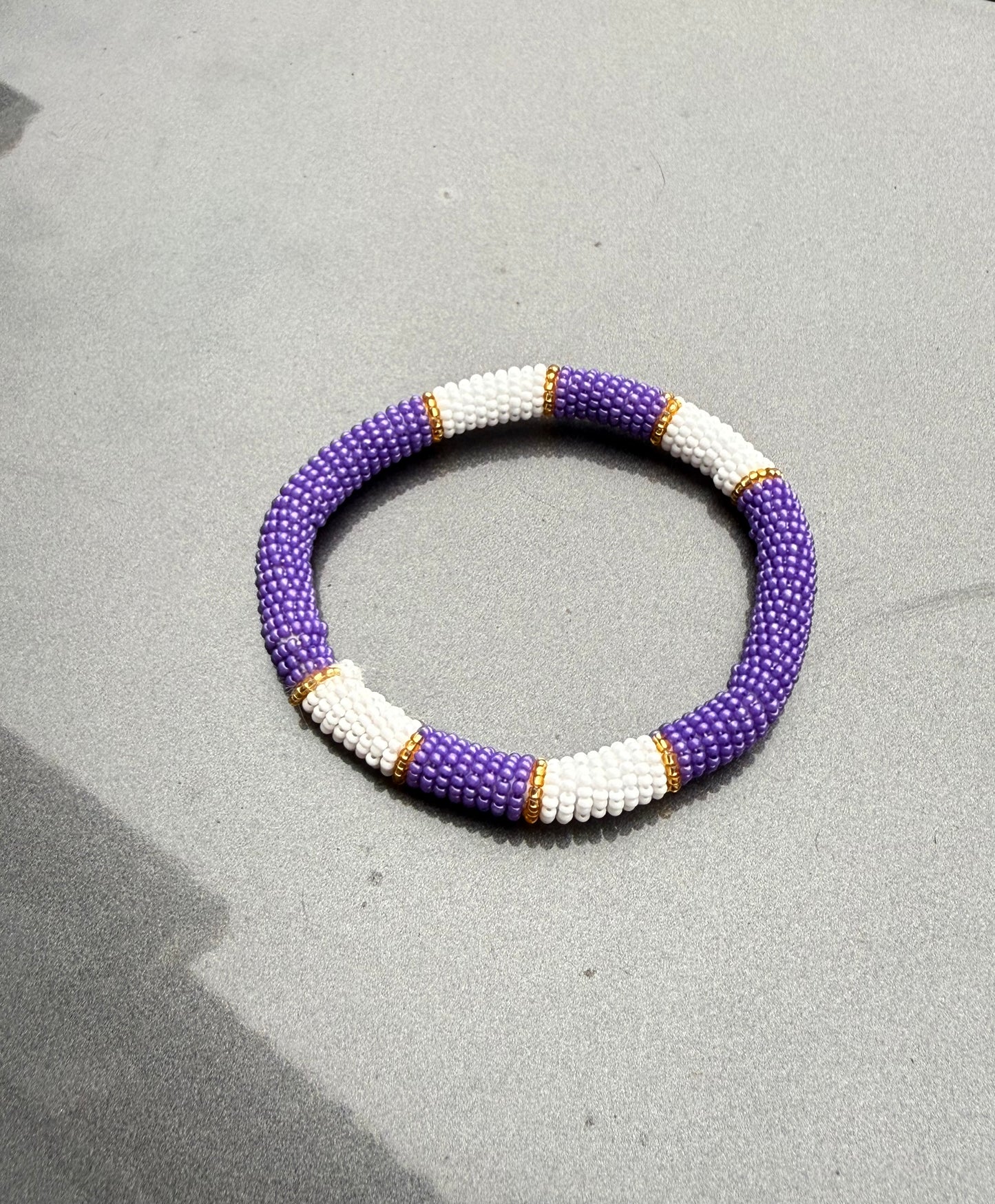 Purple and white bangle