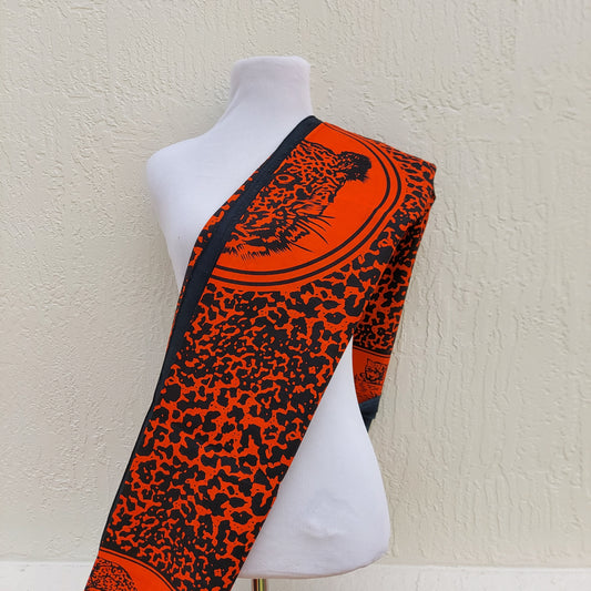 Orange Leopard Ibhayi lamadlozi. Ancestral fabric